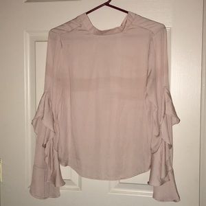 Blouse with button closure on back